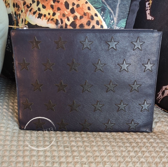 Saint Laurent Handbags - ⚡ FLASH SALE - Saint Laurent Star Leather Clutch